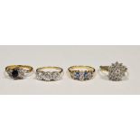 9ct gold, blue and white stone dress ring set oval stone, possibly sapphire, flanked by two very