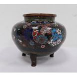 Japanese cloisonne enamel koro, bulbous and raised on three rudimentary supports, allover