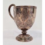 Victorian Scottish silver pedestal christening mug, having tapering bowl with anthemion and scroll