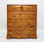 Modern pine chest of two short over three long drawers, on bracket feet, 100cm x 119cm