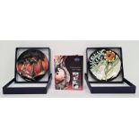 Moorcroft pottery pin tray, slip trail decoration of palm trees, 12cm diameter, boxed and another
