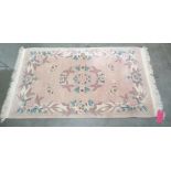 20th century peach ground Chinese superwash rug, 150cm x 92cm