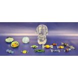 Murano glass paperweight, two other paperweights, a collection of glass-coloured sweets and a