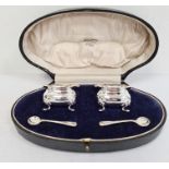 Pair silver salts, each square with shaped serpentine everted rim, gilded interiors, bulbous base,
