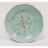 Chinese porcelain shallow dish, celadon glaze with incised waves, 23cm diameter Condition