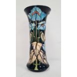 Moorcroft vase ‘Blue Rhapsody’ pattern, black ground with blue poppies with white leaves, signed ‘
