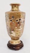 Japanese Satsuma earthenware vase, hexagonal and ovoid, decorated with panels of figures on a gilt
