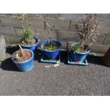 Four blue glazed planters (4)