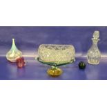 Vaseline-type glass lamp shade of ogee form, four items of coloured glass, a cut glass decanter