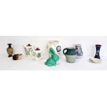 Poole pottery vase, a Torquay pottery vase, a Sylvac style green glazed rabbit, a Doulton Lambeth