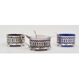 Silver three-piece condiment set viz:- oval salt, pepper and covered mustard, each with pierced