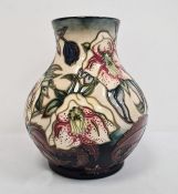 Moorcroft baluster-shaped vase (seconds), cream ground decorated with lilies, date cypher for