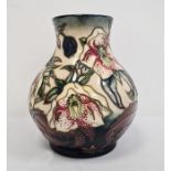 Moorcroft baluster-shaped vase (seconds), cream ground decorated with lilies, date cypher for