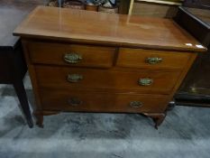 Early 20th century mahogany and satinwood strung chest of two short over two long drawers, on