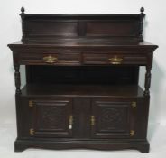 Victorian oak buffet with galleried back, two drawers above open recess and two cupboard doors,