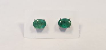 Pair of emerald studs, in silver