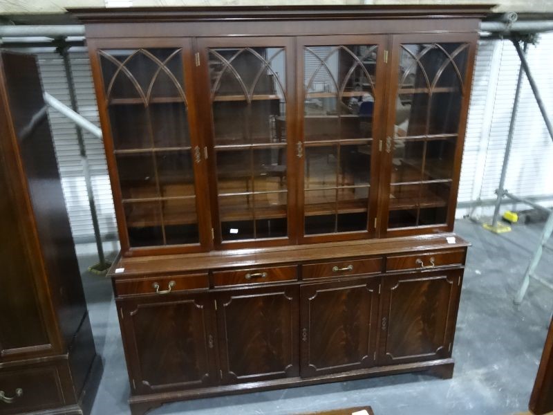 20th century mahogany dresser with four astragal-glazed doors enclosing shelves, above four