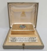 20th Century 18ct gold box, the three colour inlaid gold lid with enamel heraldic coat of arms