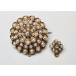 Victorian yellow gold, diamond and pearl brooch/pendant of circular flowerhead form and centred by