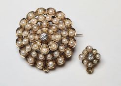 Victorian yellow gold, diamond and pearl brooch/pendant of circular flowerhead form and centred by