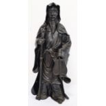 Chinese bronze standing figure of bearded man holding a staff and bamboo fan, 30cm high