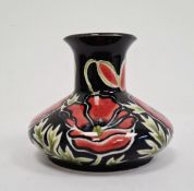 Cobridge baluster vase, black ground with pink flowers, marked with initials ‘RW’, 9cm high approx