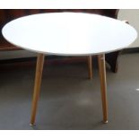Modern circular breakfast table with white top, on four turned supports, 89cm diameter