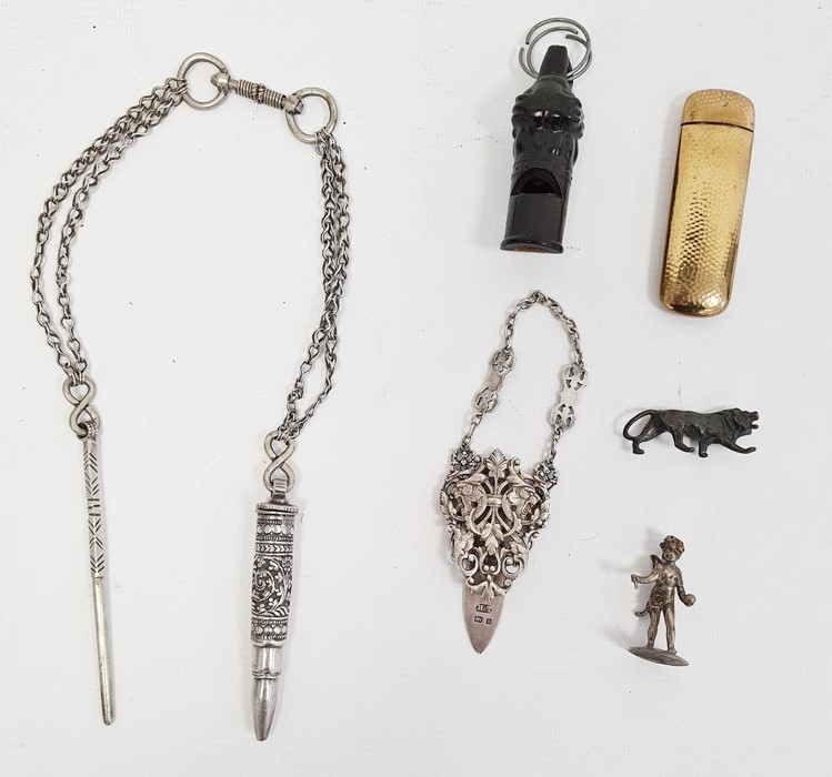 Assorted items to include dog whistle in the form of dog's head, silver clip with lion's head and