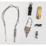 Assorted items to include dog whistle in the form of dog's head, silver clip with lion's head and