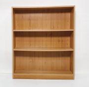 Modern pine-effect open bookcase on plinth base