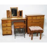 Modern pine chest of two short over three long drawers, a dressing table, a three-part mirror, a
