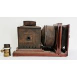 W. Gibbons horizontal enlarger with mahogany case, circa 1880-1890 with an additional brass lens,