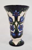 Moorcroft vase, signed ‘S. Hayes’, cream ground, of flared form with blue flower decoration, 15cm