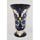 Moorcroft vase, signed ‘S. Hayes’, cream ground, of flared form with blue flower decoration, 15cm