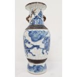 Japanese porcelain and stoneware crackle-glazed baluster vase with charging warriors in underglaze