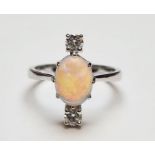 18ct white gold, opal, and diamond ring, boxed, opal 1.35ct, diamonds 0.33ct
