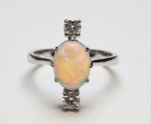 18ct white gold, opal, and diamond ring, boxed, opal 1.35ct, diamonds 0.33ct