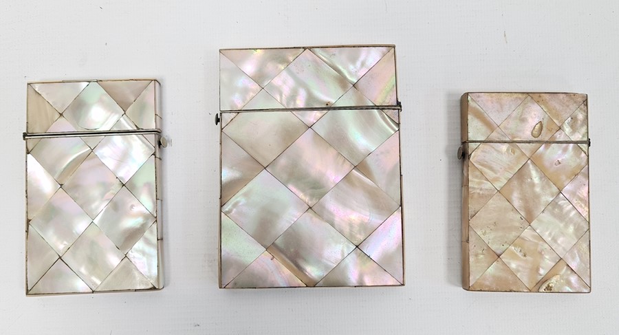 Three mother-of-pearl card cases (3)  Condition Report1; 8.5x5.25 cm - very yellowed, scratches ,