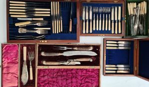 A carving set with bone handles and electroplated mounts in oak inlaid box together with various