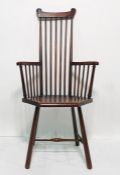 Circa 1920's stickback armchair, possibly J S Henry of London with carved top rail, stick back and