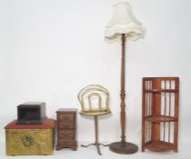 Standard lamp, an onyx-topped coffee table, a corner unit, a magazine rack, a miniature chest of