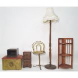 Standard lamp, an onyx-topped coffee table, a corner unit, a magazine rack, a miniature chest of