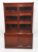 20th century mahogany sectional bookcase with three sections with glazed hinged doors and one