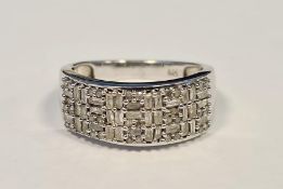 Diamond and silver pave set ring set variously rectangular cut stones