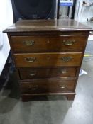 20th century oak chest of four drawers, the top with applied moulded edge, brass handles and