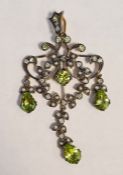 Edwardian-style pendant set with peridots, seed pearls and diamonds