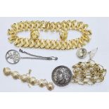 Large quantity of costume jewellery to include necklaces, simulated pearls, brooches and a small