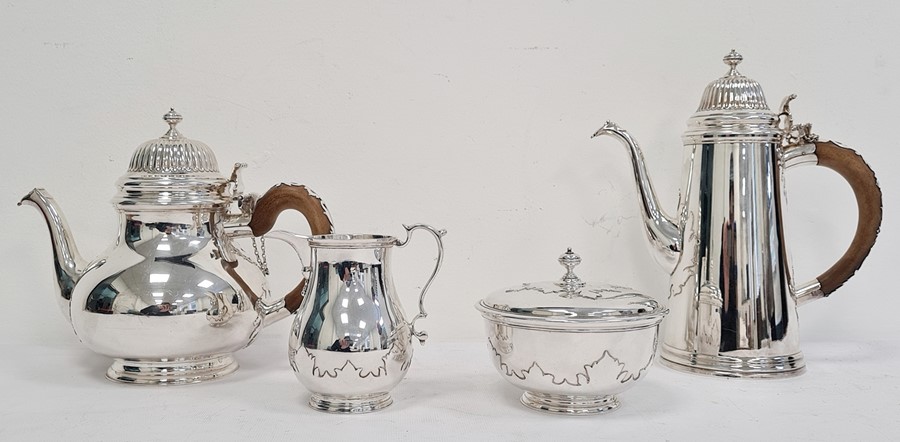 Twentieth century four-piece silver tea service, comprising lidded sugar pot, teapot, cream jug