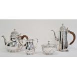 Twentieth century four-piece silver tea service, comprising lidded sugar pot, teapot, cream jug