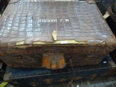 Please note altered catalogue description   ..Vintage Crocodile leather trunk, initialled MJ , 51 x